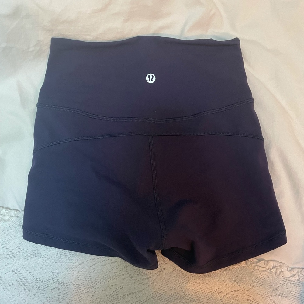 Purple Lululemon tight shorts size 2
